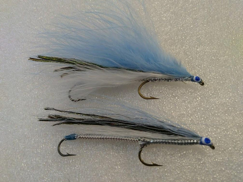 Blue and white feather tandem fishing lure with two hooks and bead heads