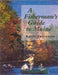 Cover of book showing fall scene of couple fly fishing from a canoe