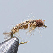 Net spinning caddis fly lure with tan and brown fibers and pale wing