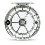 Fishing reel, matte platinum spoked spool front with central NR logo and dark knob