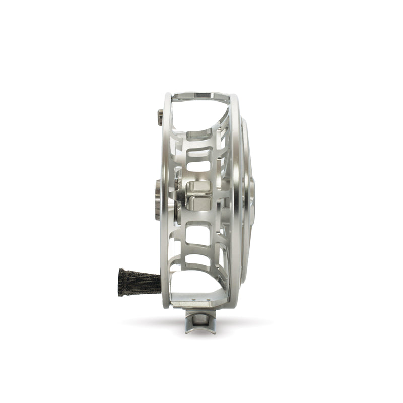 Fishing reel, matte platinum side view with arched cutouts and silver frame