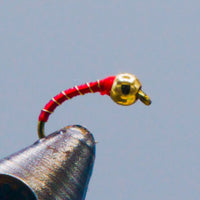 a fishing fly called a red zebra midge tied in Rangeley Maine