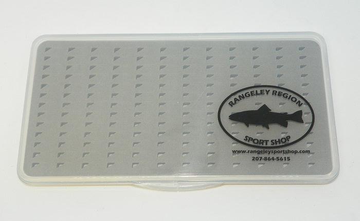 Slim fly box base with textured foam and peg-hole pattern, with logo label