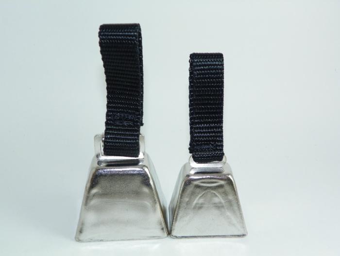 two sizes of nickel plated cowbells for dogs used in hunting upland birds